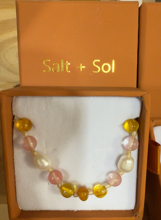 Amber & Strawberry Quartz Teething Necklace - By Salt + Sol